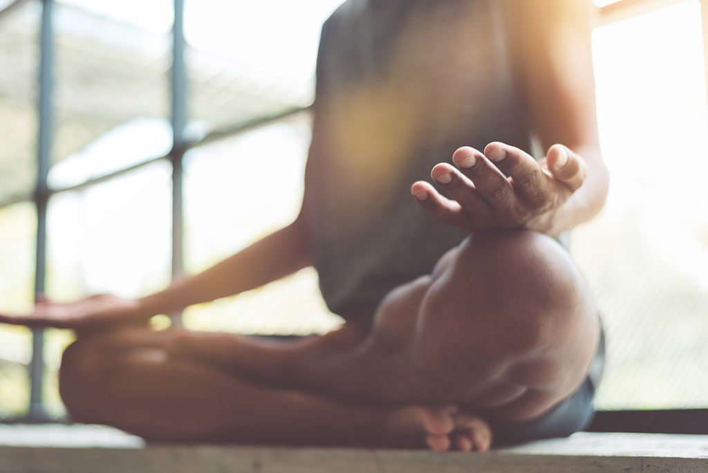 person in yoga pose can mindfulness meditation work for addiction