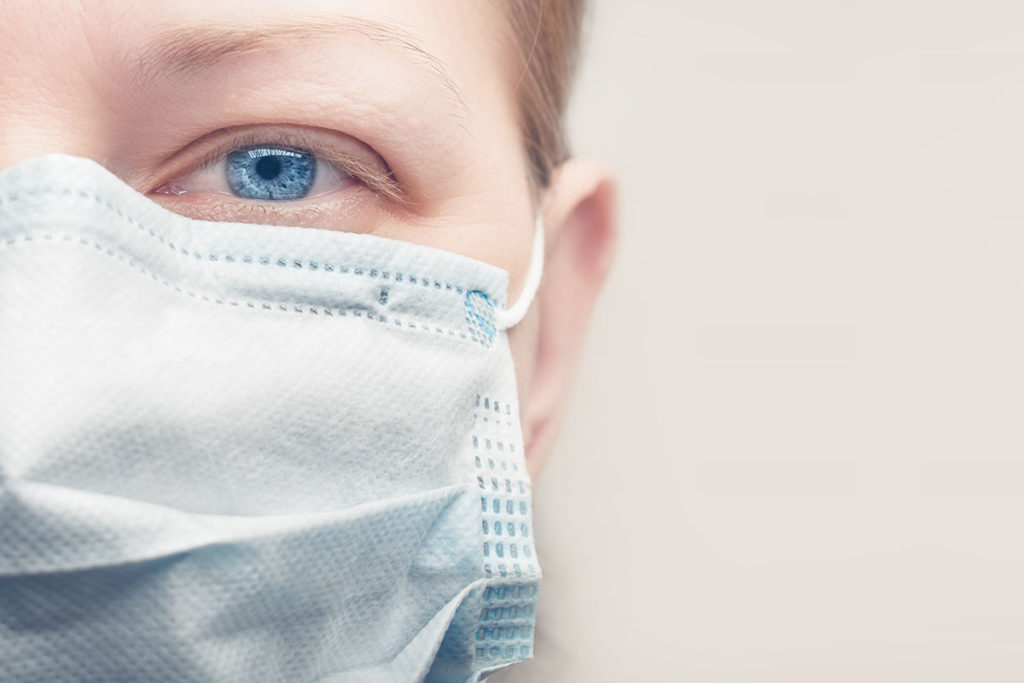 person wearing surgical mask epidemic vs pandemic