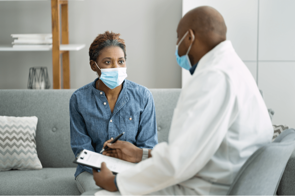 Woman talking to doctor about options other than prescription opioids