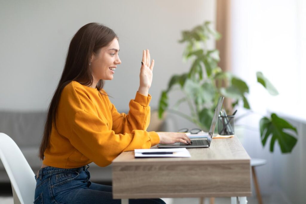 young woman interacting virtually through laptop learning how does virtual recovery work