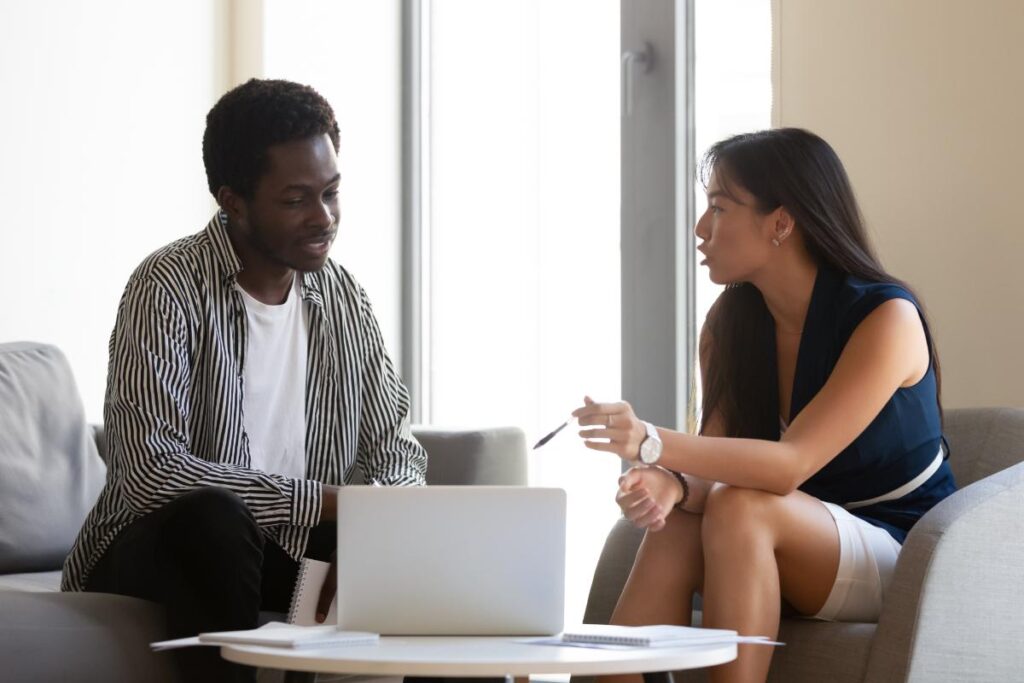 Two people talking about what to bring to rehab