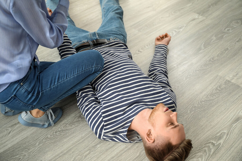 Person lying on floor and wondering, "What are the risks of tranq?"