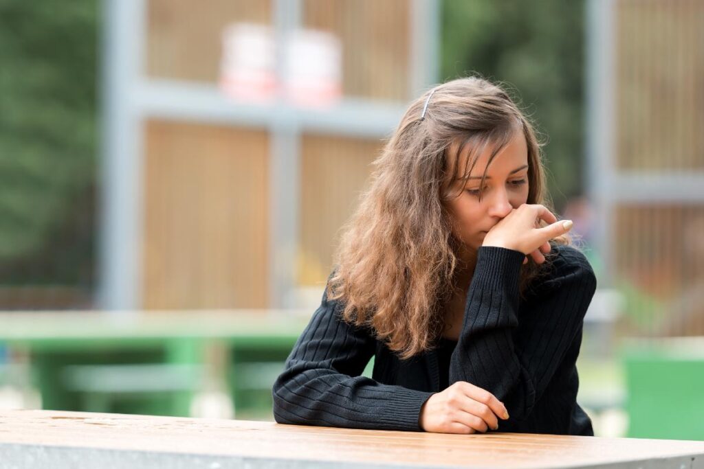 Person struggling with prescription drug misuse