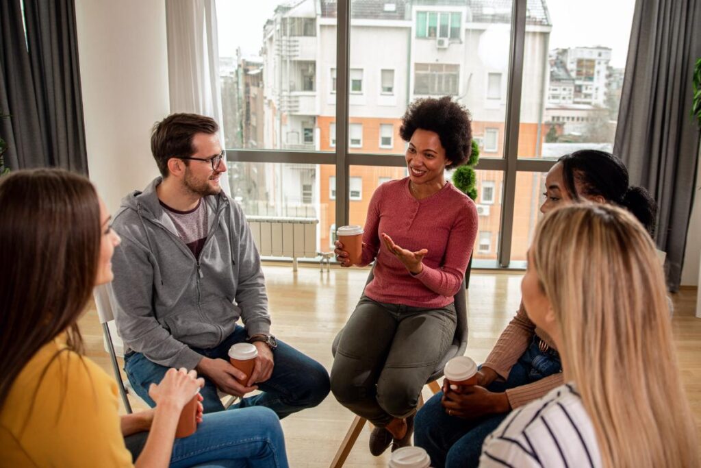 People experiencing group support during a therapy session