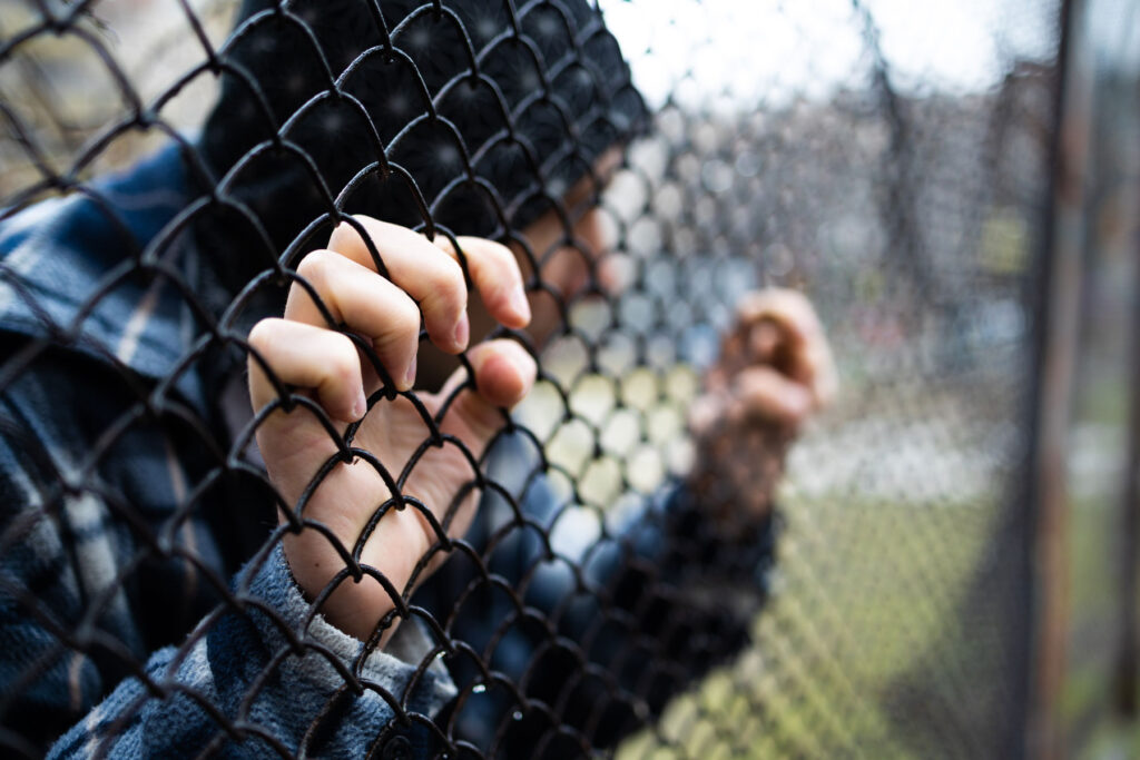 a young person struggles with an addiction to the opioid heroin