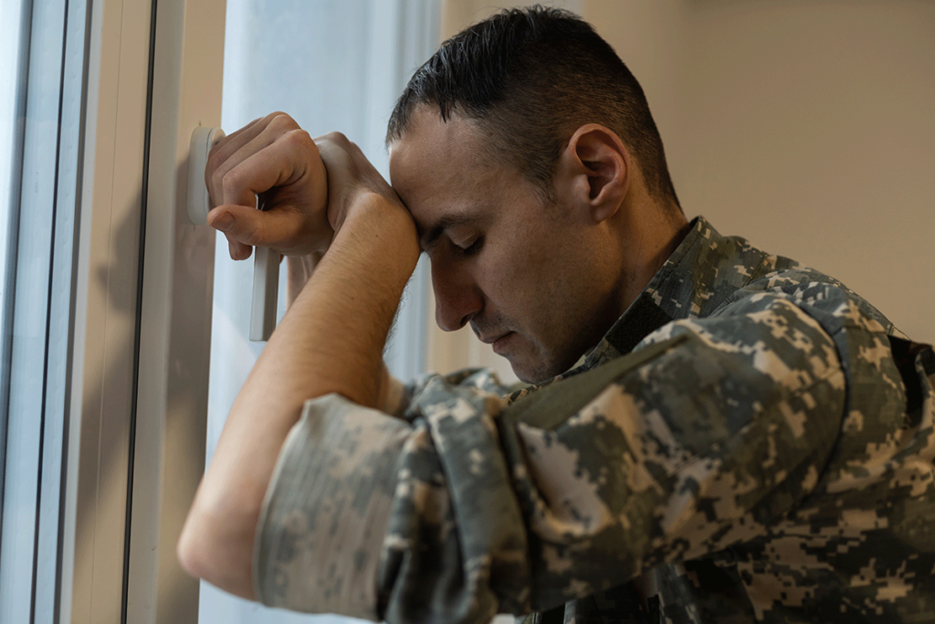 Person thinking about substance abuse in veterans