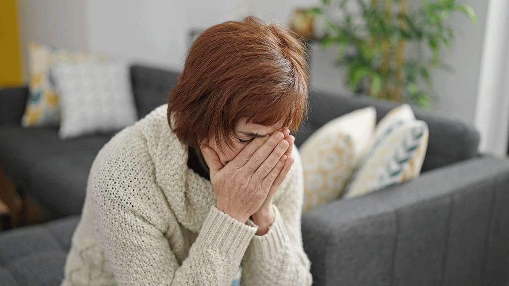 Person with face in hands, wondering what NSAIDs are