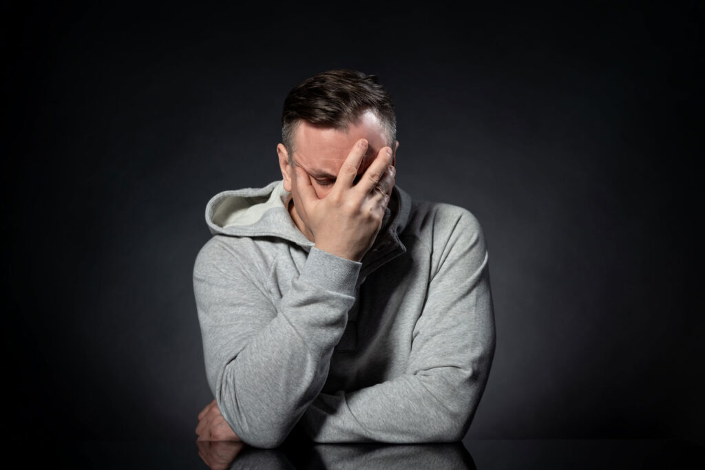 Person thinking about how long meth stays in the body