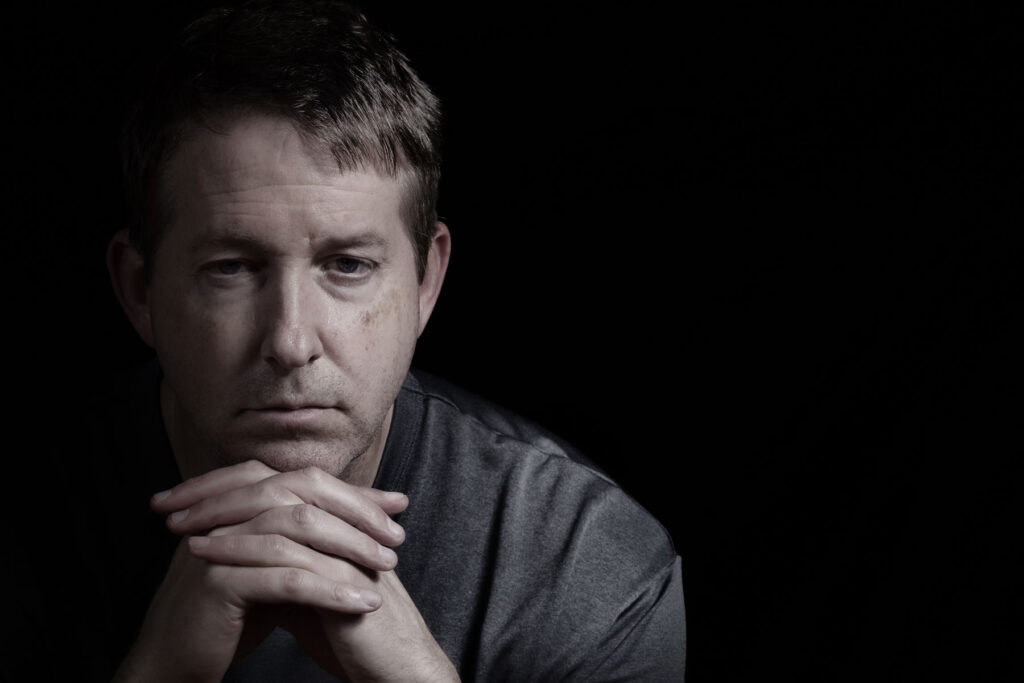 Person thinking about anxiety and drug abuse