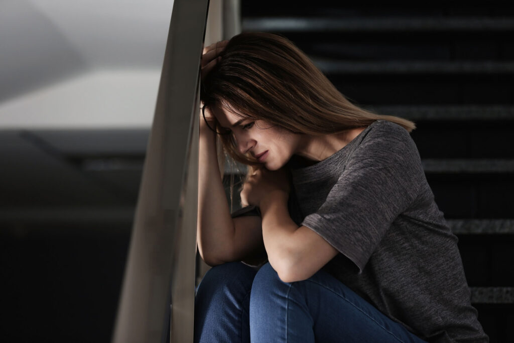 Person thinking about what to do in case of a heroin overdose