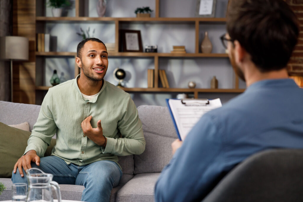 Person talking to their therapist about making amends