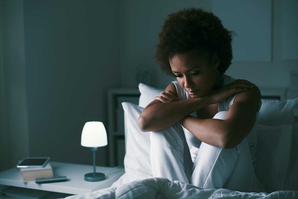 Person thinking about addiction in women